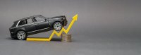 Rising cost of new and used cars, rising car sales, rising costs of insurance and car loans. Rising car prices.Copy space.